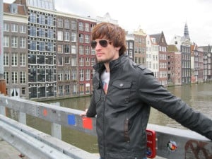 Me (Chris) standing at the canal by Rembrandtplein (where Rembrandt’s former house is) in Amsterdam.