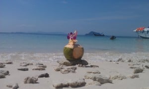 Post China trip, relaxing on the beach in Thailand, on Phi Phi Beach. Great, fresh Pina Coladas!
