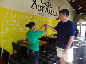 Since last year, Antonio has opened a cafe that employs deaf and mute people. To order, you must use sign language. In this picture, our professor, Peter Roberts, is signing his name out to one of the waitresses. Unbelievably cool stuff. The name of the place, “Cafe de Las Sonrisas” means Cafe of the Smiles.