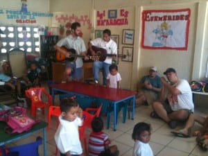 Peden played the guitar with one of the teachers and we did the Hokey Pokey with the kids. Look at Professor Roberts getting into it :).