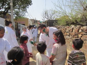 Day 4 - 3:00pm: Let the Holi festival begin! We celebrated by throwing colored powder at each other and played with the kids and other villagers. It was one of the best experiences on the trip! Who knew getting covered in powder from head to toe could be so much fun.