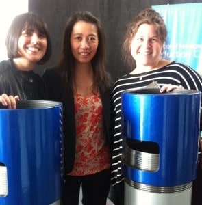Teona, Li, and Lila examine the premium pipe connection at the Tenaris steel plant.