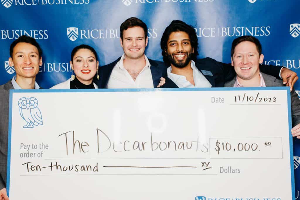 Photo of the team with Winning Check! Pictured (Left to Right): Eike Hoffmann, Valeria Robles, Cameron Bard, Sai Konkala, Mel Bethune