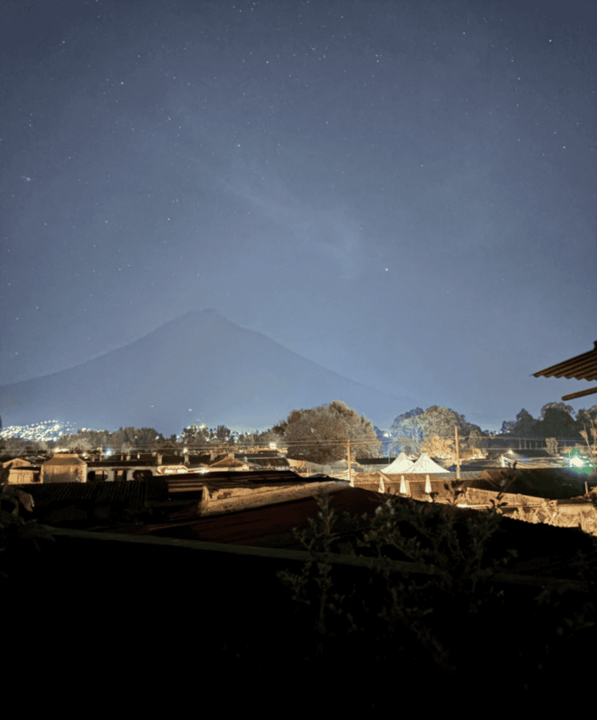 Night in Antigua with Volcán de Agua in the distance