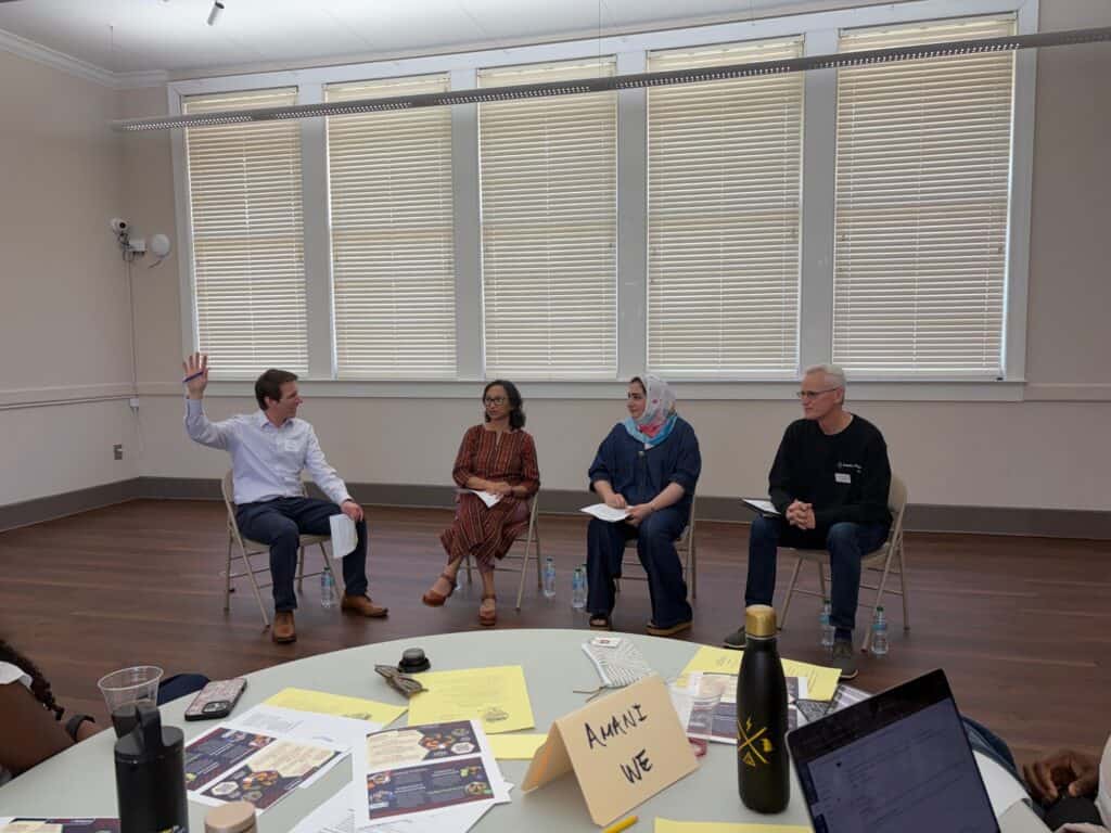 Brian Goebel leading a community panel featuring Sushma Barakoti, Executive Director of Refugee Women’s Network, Joe Breedon, Board member of Friends of Refugees, and Shaista Amani, Executive Director of Afghan American Alliance of Georgia.